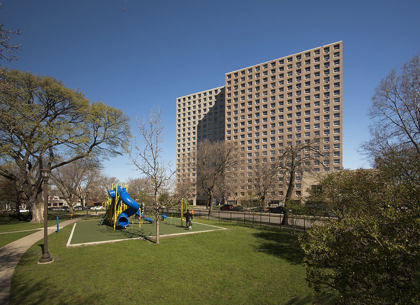mid rise building with playground