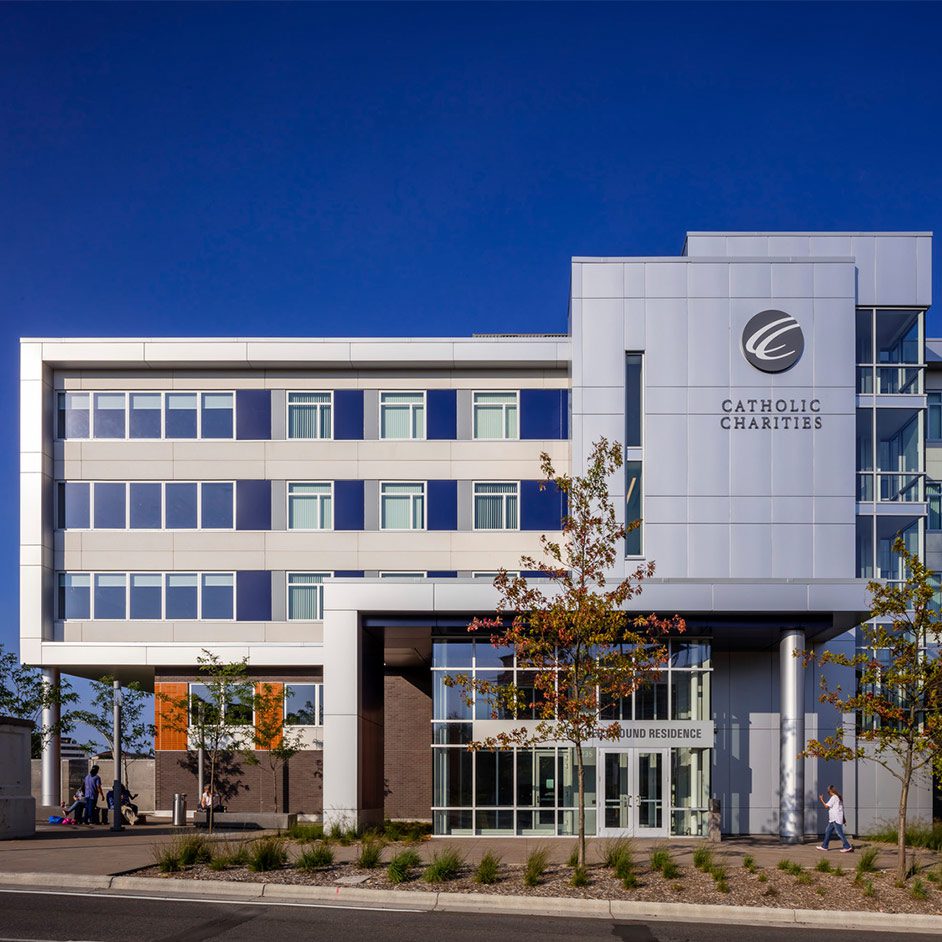 exterior view of a 5 story building and landscape