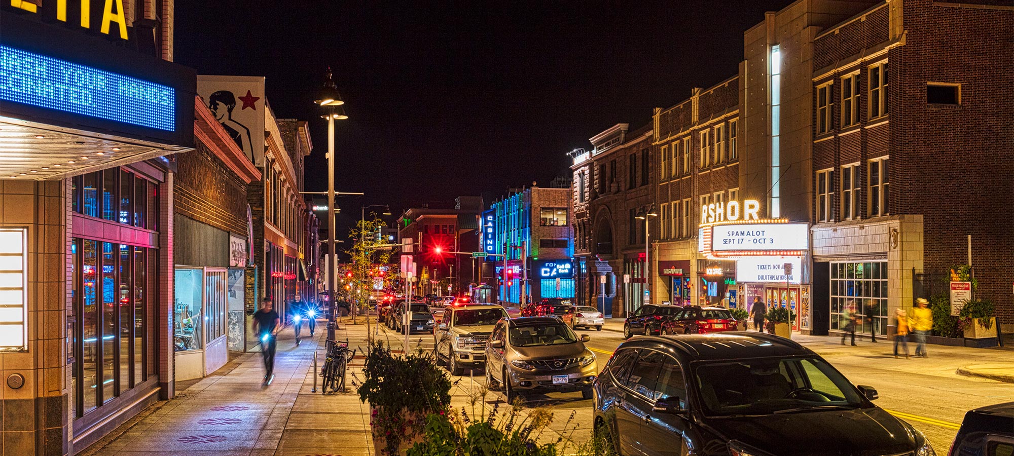 Street level view of downtown street at night