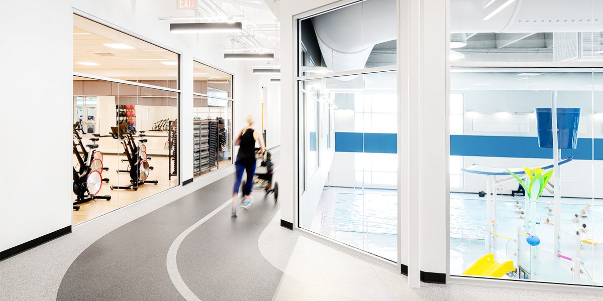 person running on indoor track