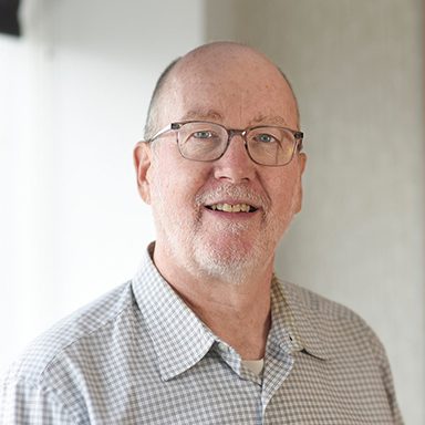 portrait of man in white shirt