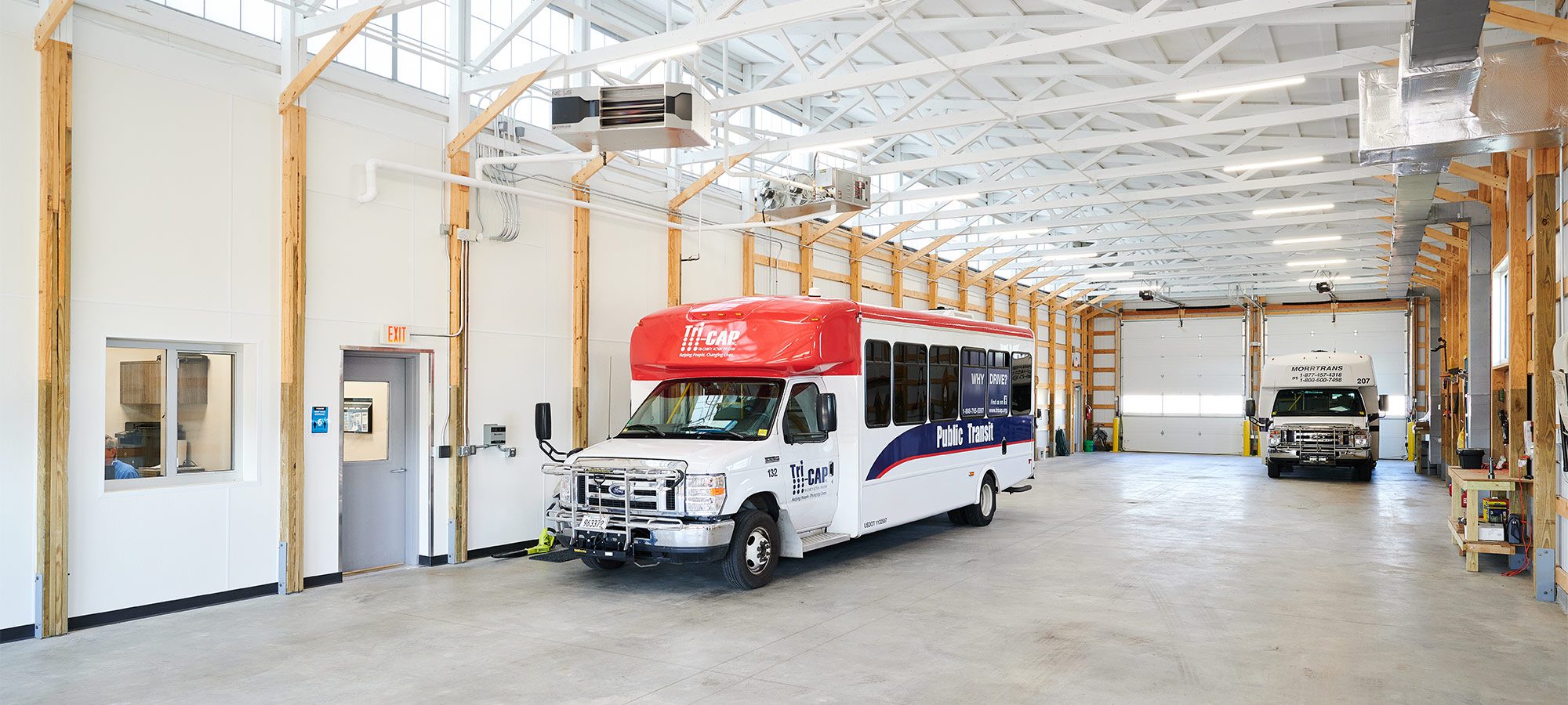 shuttle bus in a high bay garage