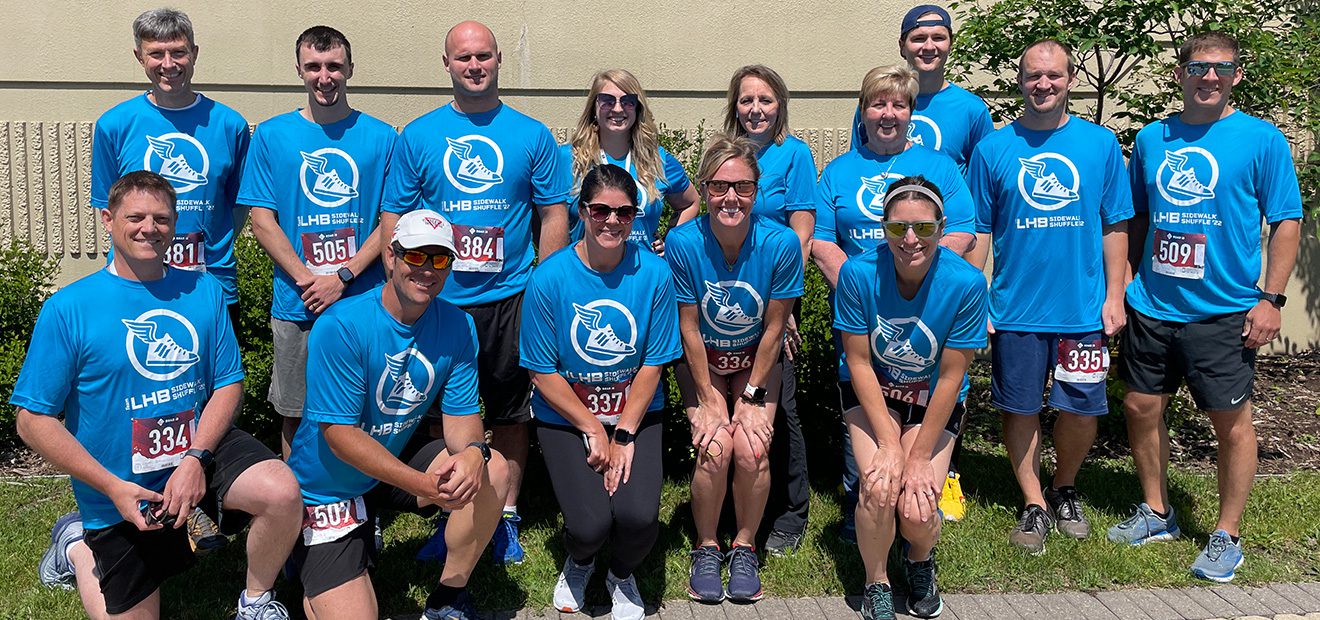 A group of runners pose for a photo before the race