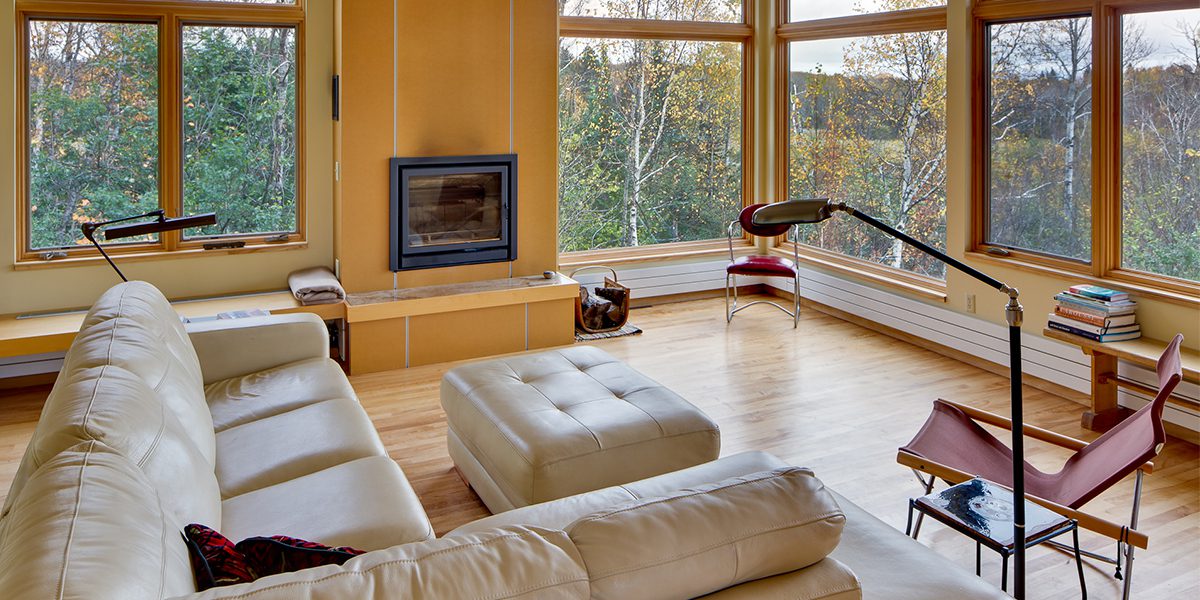 Living room with fireplace and windows