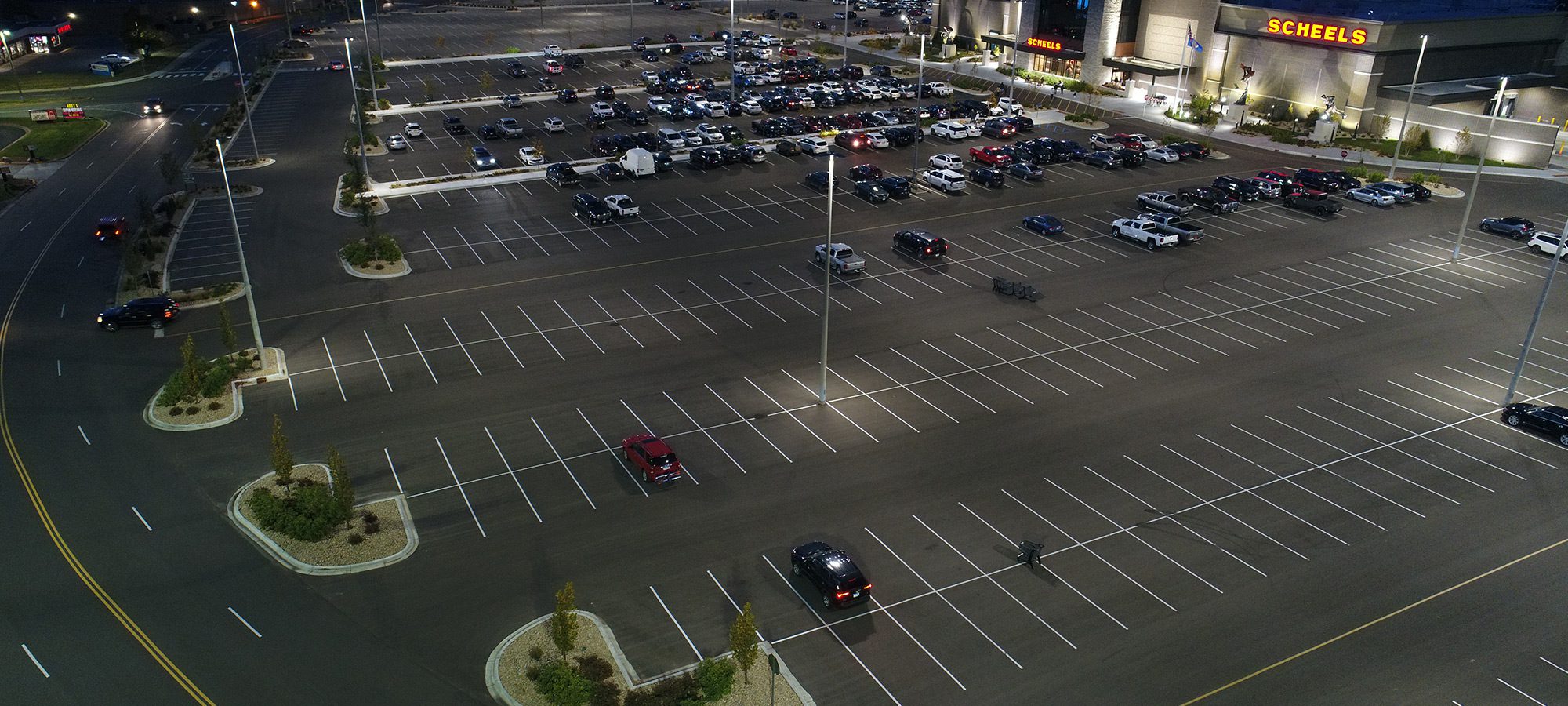 Cars in a dark parking lot