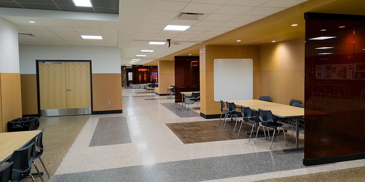 tables and chairs in hallway